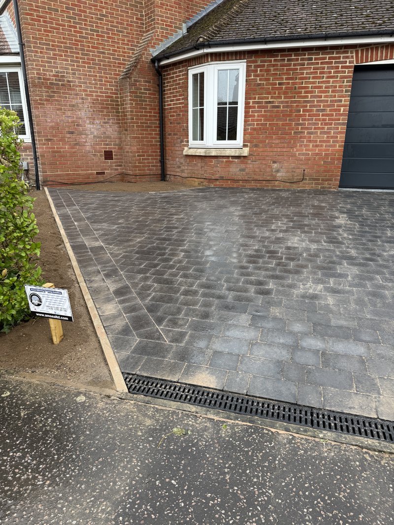 Rumbled, Three size, Concrete, Marshalls block paving installation process in Kemmann Way, Great Cambourne, Cambridge, CB23 5AU